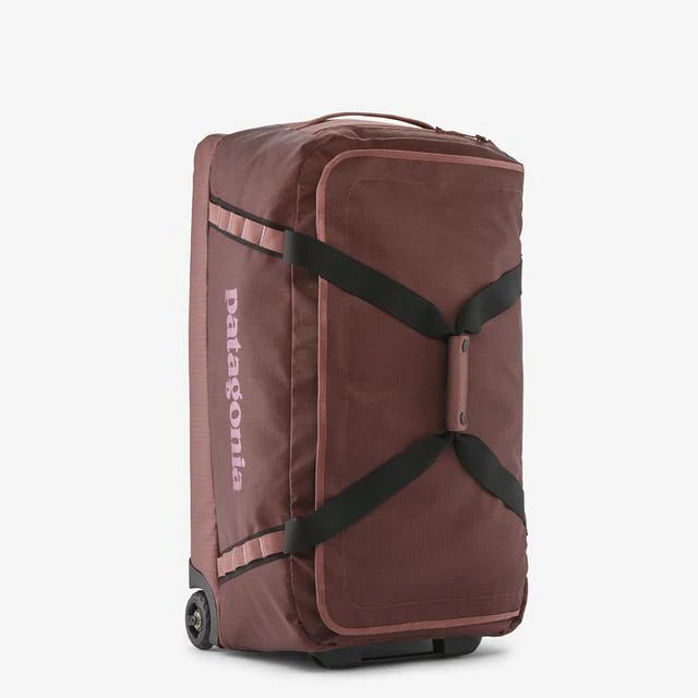2025 Black Hole Wheeled Duffel 70L - Bolsa con ruedas de tejido reciclado