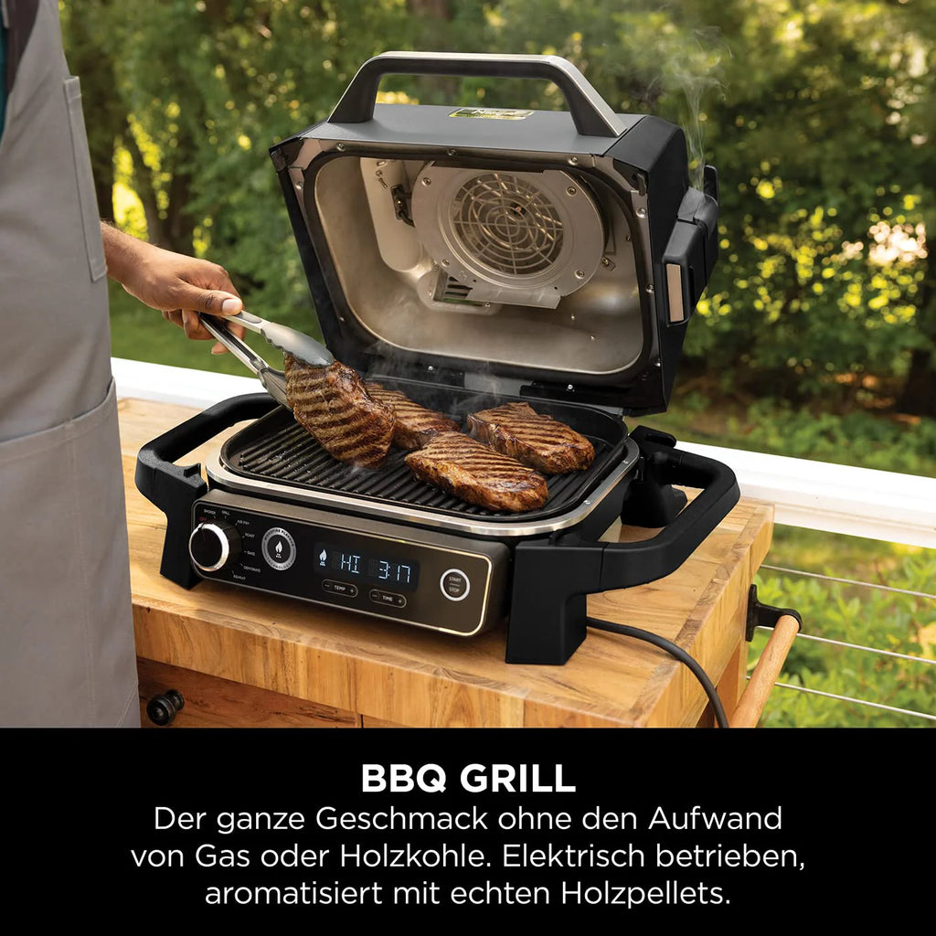 2025 Ninja Woodfire Grill Eléctrico & Ahumador & Freidora de Aire, Parrilla Exterior 7 en 1, Air Fry, Ahumado, Asado, Cocción, Resistente a la Intemperie, Antiadherente, Portátil, Eléctrico, Gris/Negro OG701EU