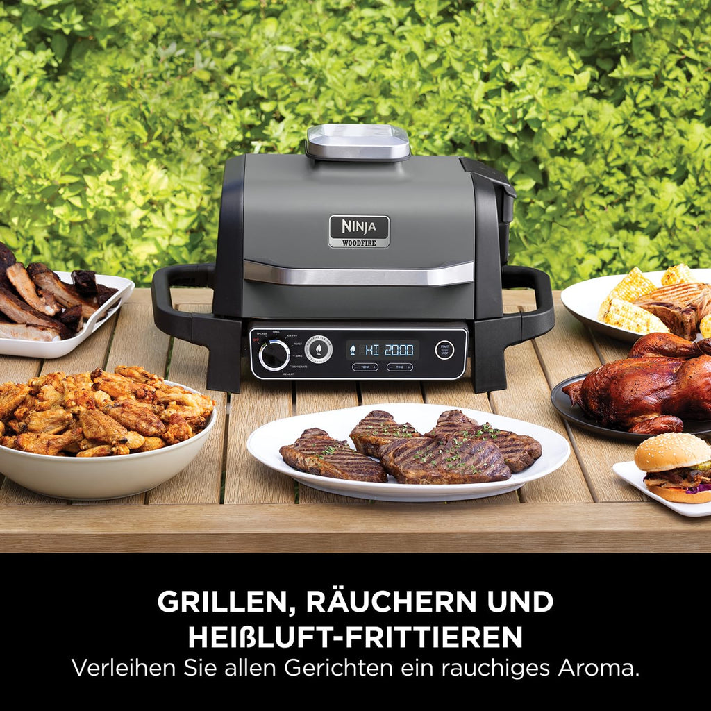 2025 Ninja Woodfire Grill Eléctrico & Ahumador & Freidora de Aire, Parrilla Exterior 7 en 1, Air Fry, Ahumado, Asado, Cocción, Resistente a la Intemperie, Antiadherente, Portátil, Eléctrico, Gris/Negro OG701EU