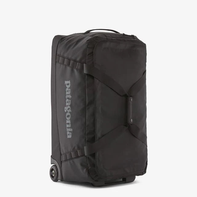 2025 Black Hole Wheeled Duffel 70L - Bolsa con ruedas de tejido reciclado