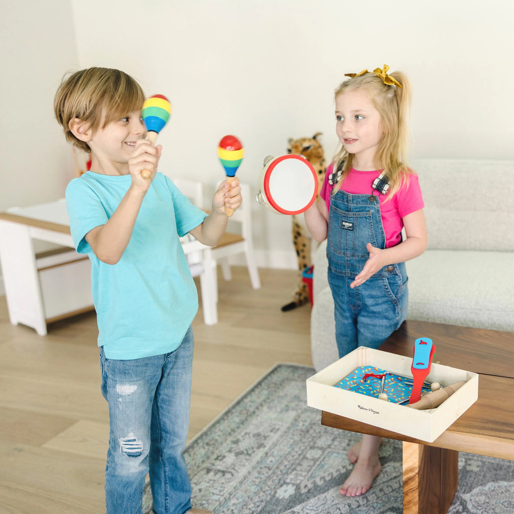 Melissa & Doug Band-in-a-Box ¡Aplaude! ¡Choca! ¡Toca! – Set de Instrumentos Musicales de 10 Piezas