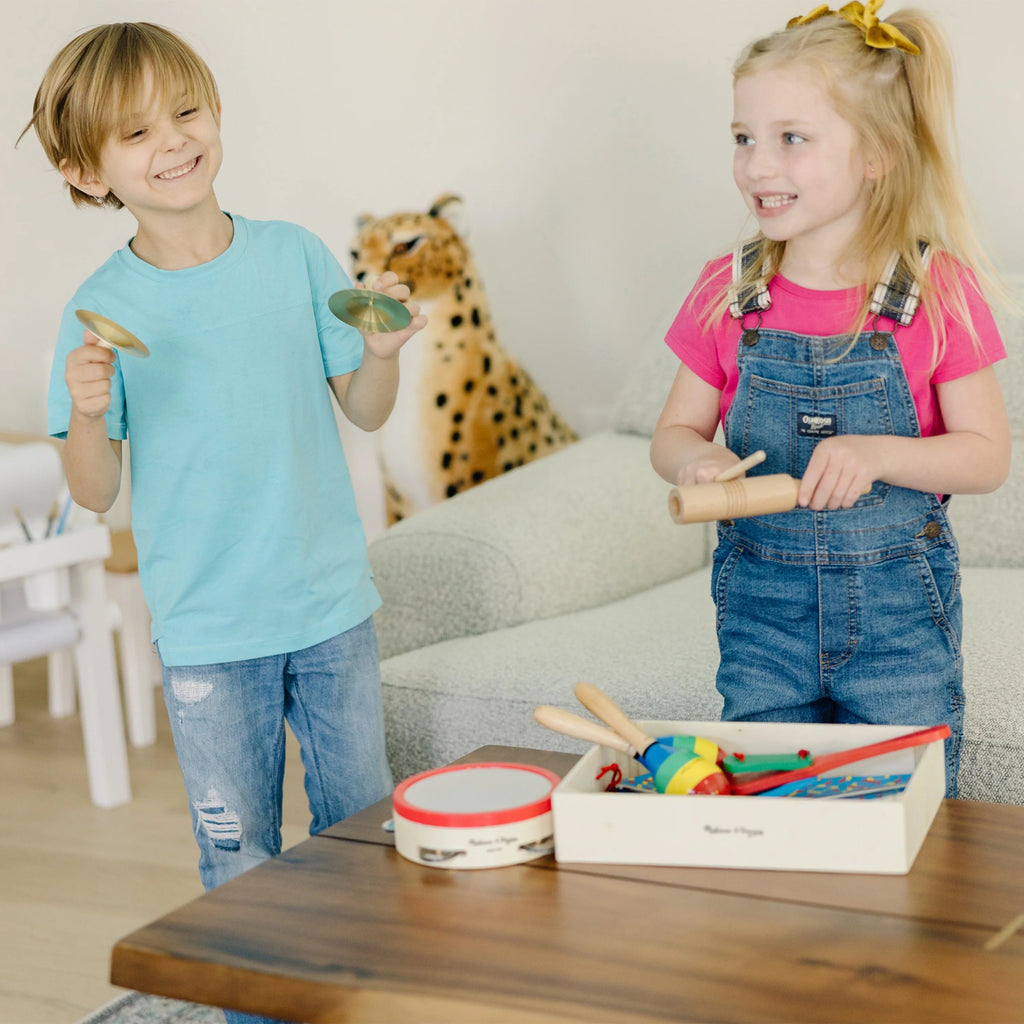 Melissa & Doug Band-in-a-Box ¡Aplaude! ¡Choca! ¡Toca! – Set de Instrumentos Musicales de 10 Piezas