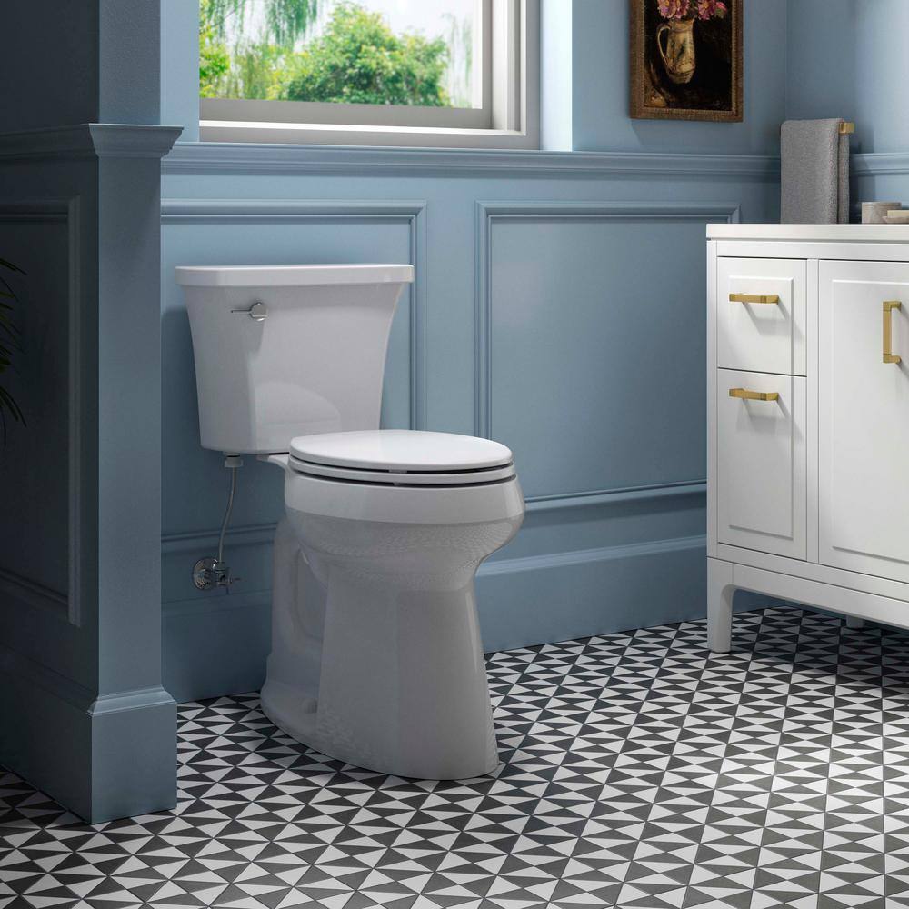 Inodoro KOHLER Extra Alto Highline Arc de Dos Piezas con Descarga Simple 1,28 GPF, Alargado, Blanco (Asiento Incluido)